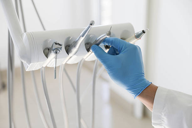 Professional Tooth Extraction technician working in Pecan Acres, TX